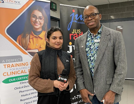 District Director Leslie Benfield, on right, speaks to Jus TV reporter, Avleen Kaur on left, about plans to launch a new South Asian Toastmasters club called Namaste Toastmasters in Brampton.

